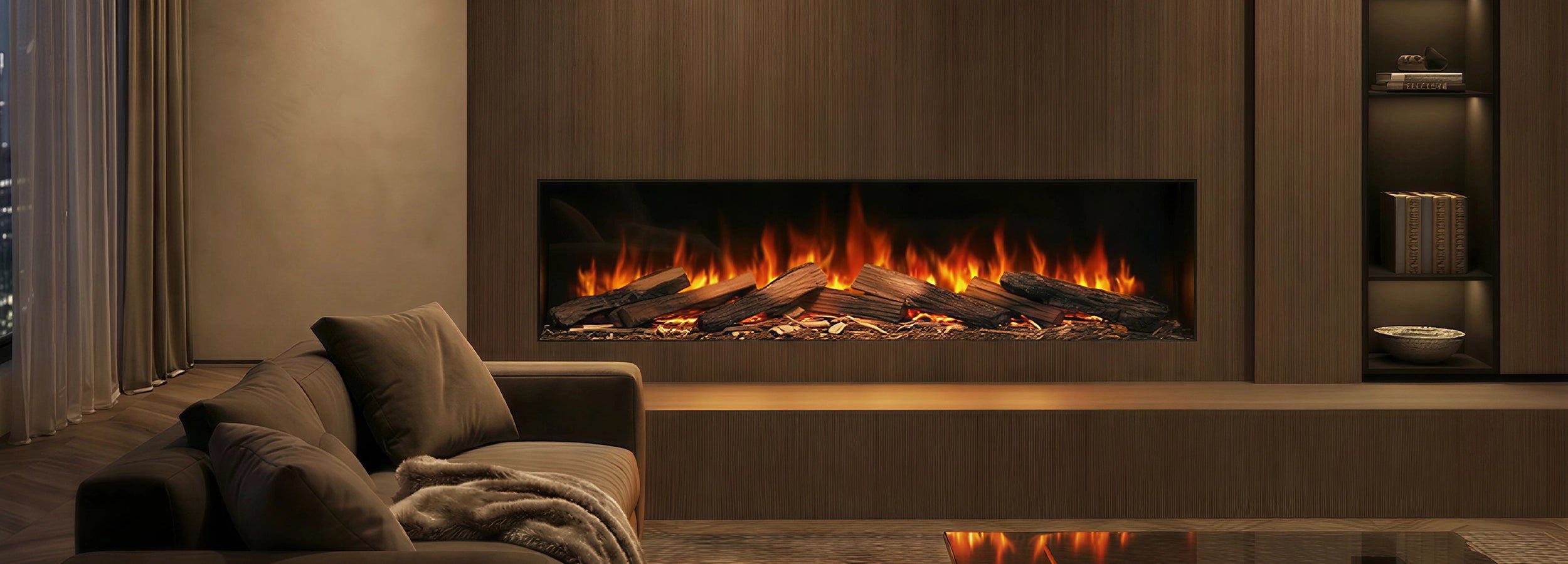 Modern electric fireplace in a living room setting with decorative pillows and a rug.