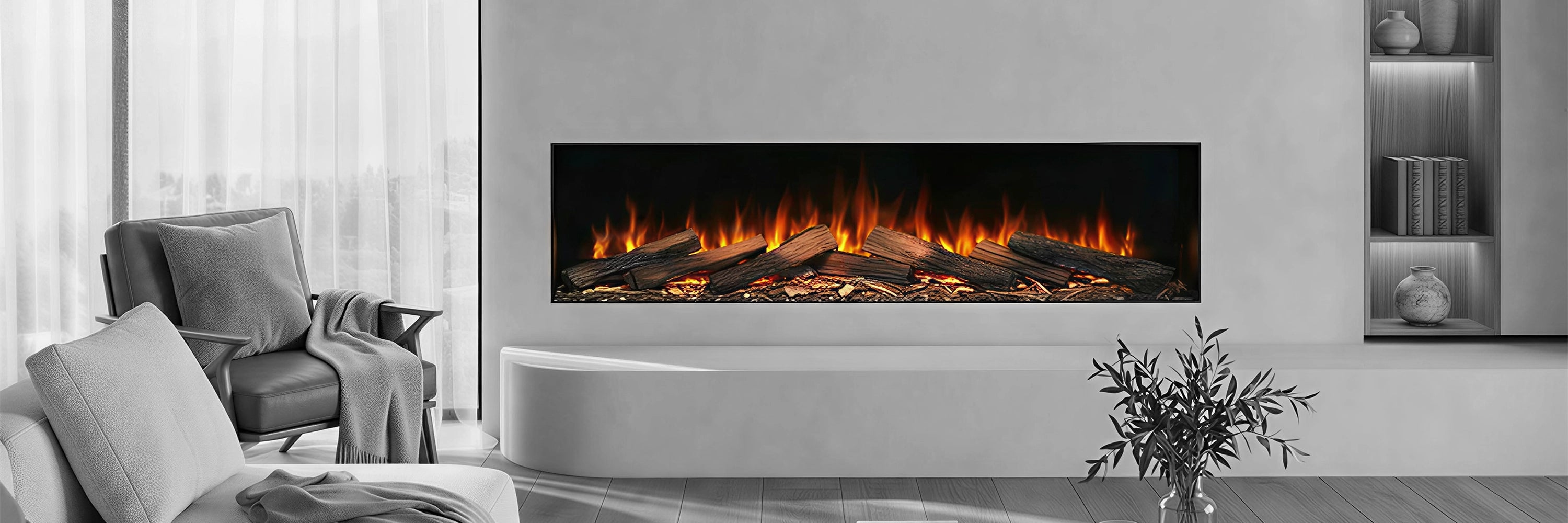 Modern electric fireplace in a living room setting with a sofa and decorative items.
