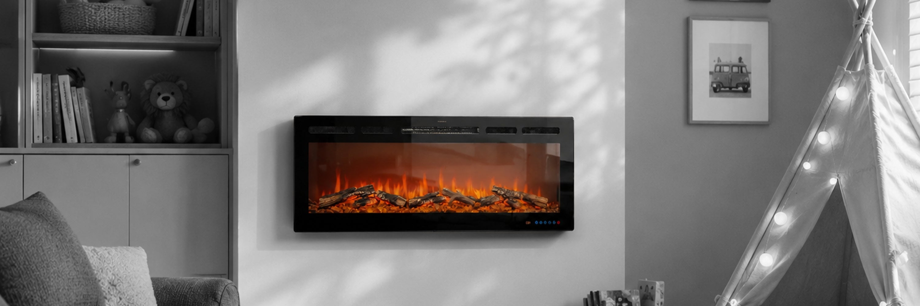 Electric fireplace mounted on a wall in a living room setting with books and decor.