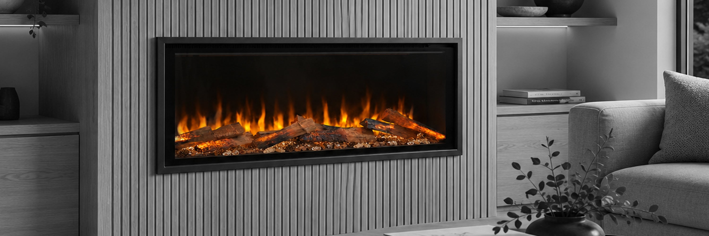 Modern lumo comfort electric fireplace embedded in a wall with a cozy living room setting.